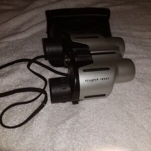 Sharper image binoculars 10-30 x 25 with carrying case compact